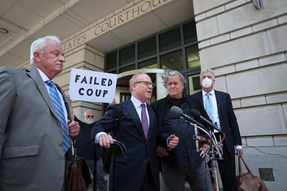 robert costello standing with steve bannon outside a courthouse