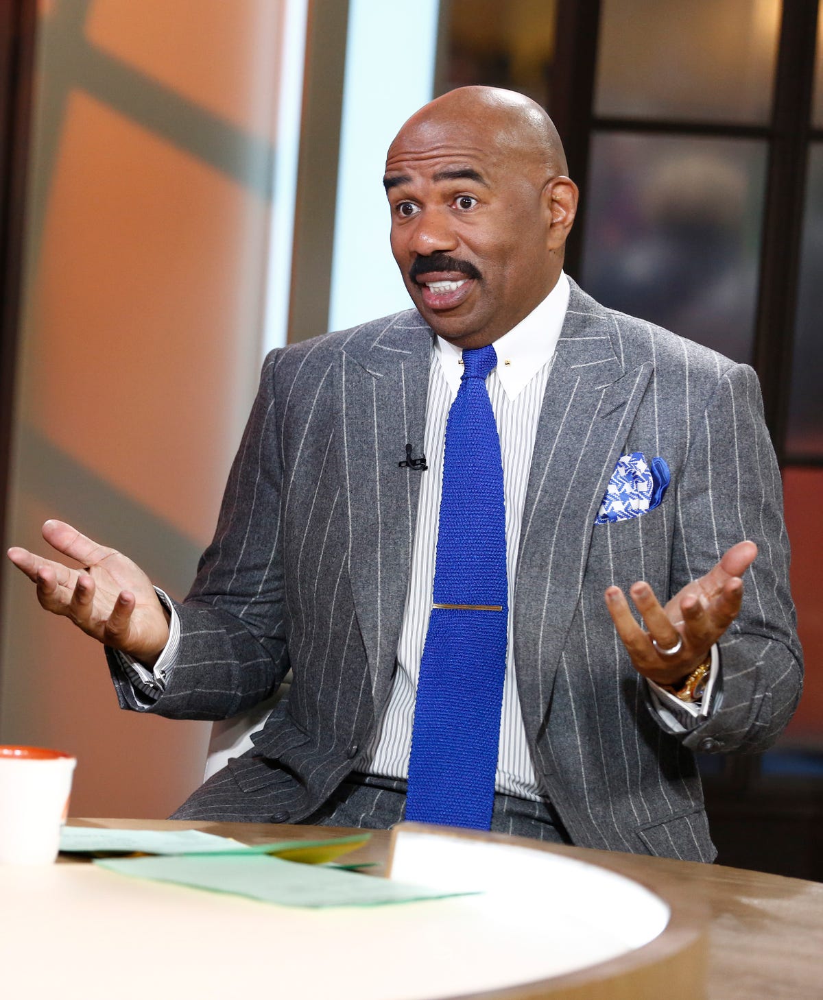 'family feud host steve harvey reacts to his wife, marjorie