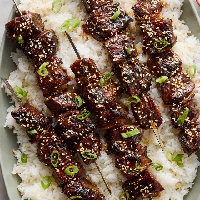 marinated pieces of sirloin steak in soy and chili garlic sauce, skewered with red onion, and brushed with a sweet and savory honey garlic glaze