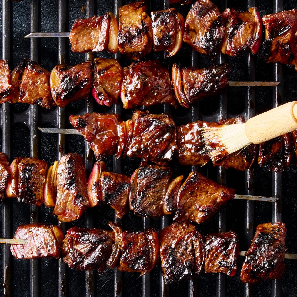 marinated pieces of sirloin steak in soy and chili garlic sauce, skewered with red onion, and brushed with a sweet and savory honey garlic glaze