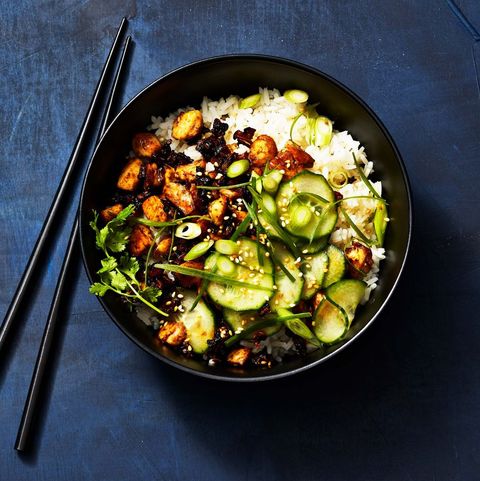 sticky tofu bowl with cucumber, rice and sliced green scallions