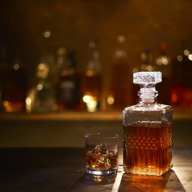 still life of bourbon whiskey on bar