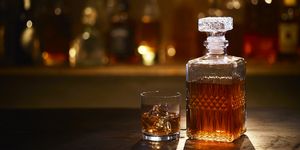 still life of bourbon whiskey on bar