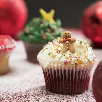 still life of christmas decorated cupcakes