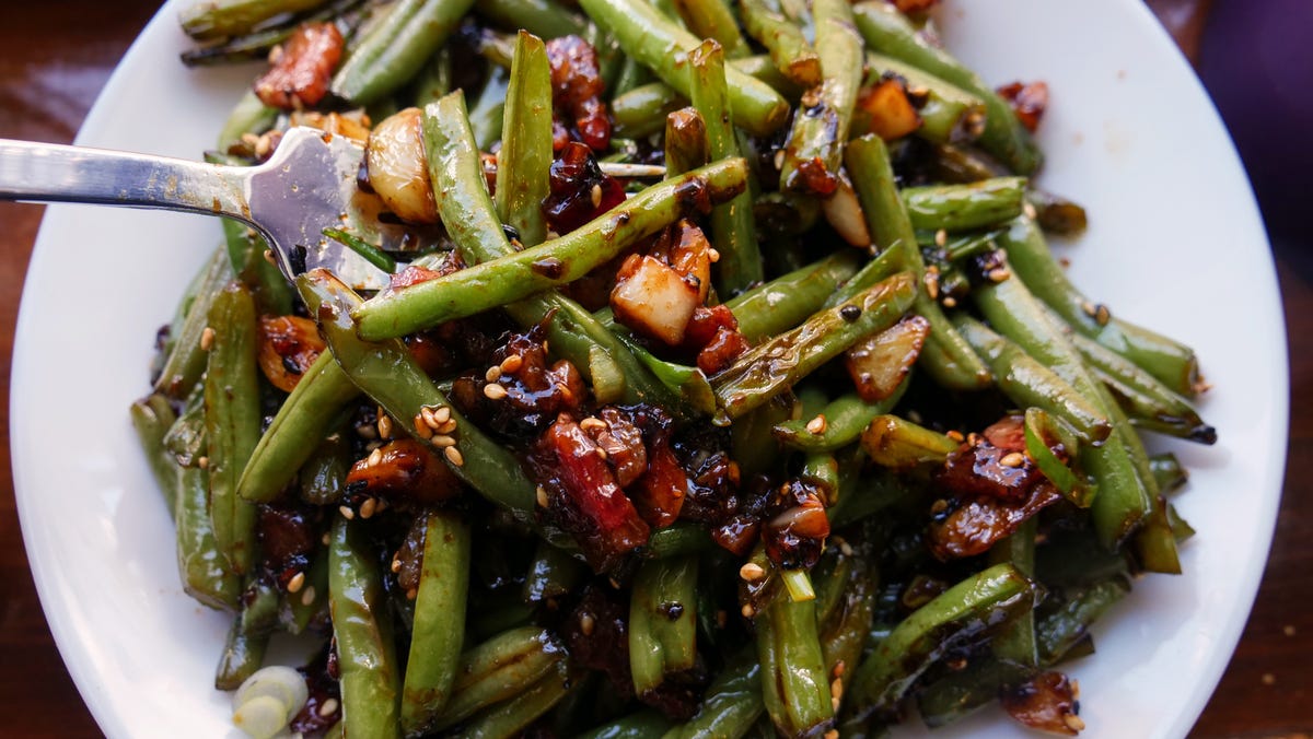 Video player poster image preview for The Garlic Is Non-Negotiable In These Stir-Fried Green Beans