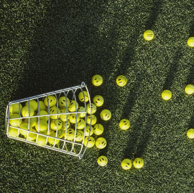 golf balls on practice range still life background