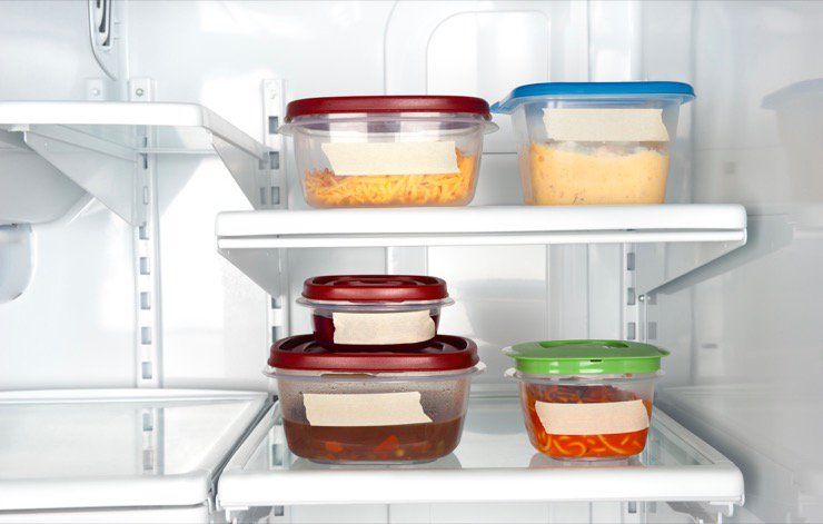 Tupperware containers full of food. 