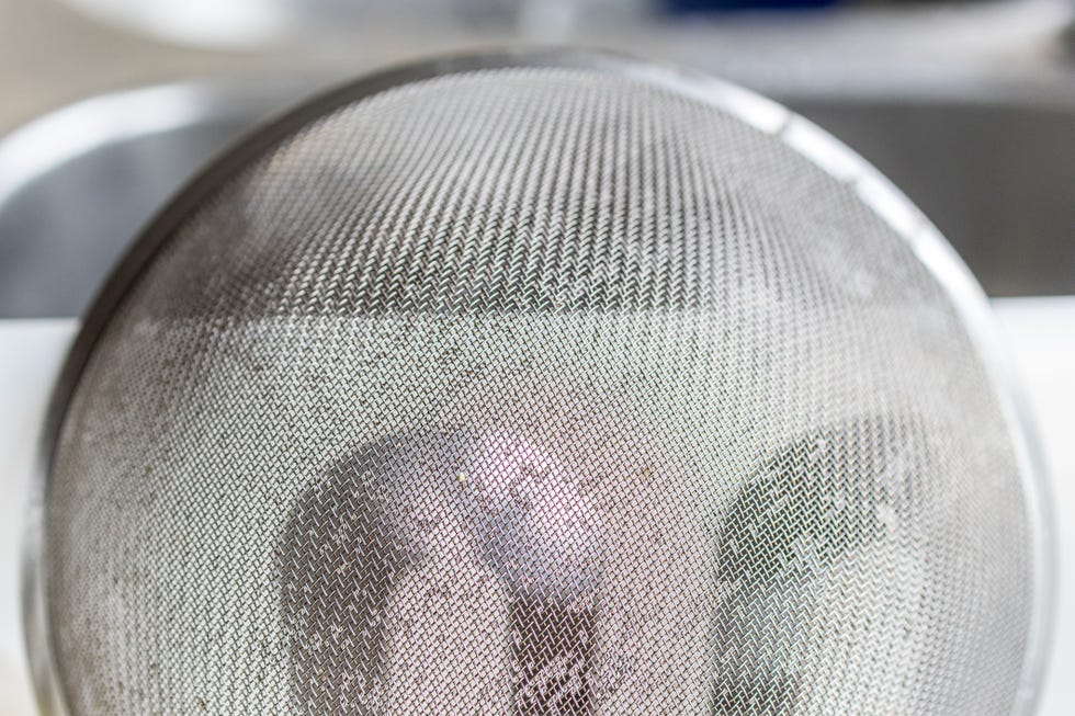 strainer drying on a domestic kitchen
