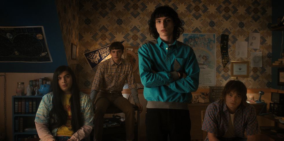 stranger things l to r eduardo franco as argyle, noah schnapp as will byers, finn wolfhard as mike wheeler, and charlie heaton as jonathan in stranger things cr courtesy of netflix © 2022
