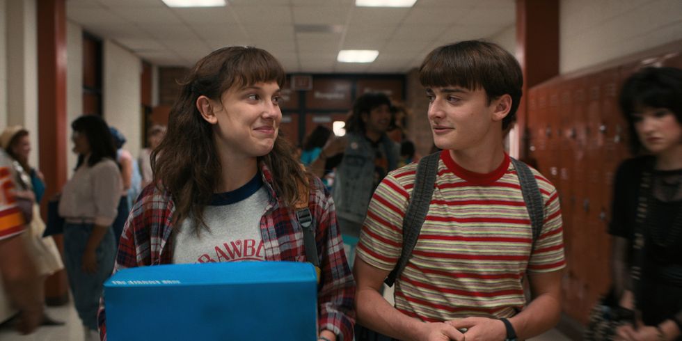 stranger things l to r millie bobby brown as eleven and noah schnapp as will byers in stranger things cr courtesy of netflix © 2022