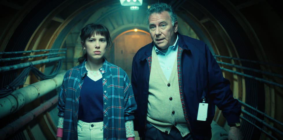 stranger things l to r millie bobby brown as eleven and paul reiser as dr owens in stranger things cr courtesy of netflix © 2022