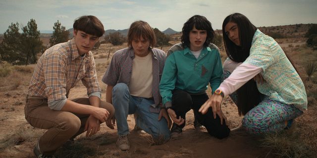 stranger things l to r noah schnapp as will byers, charlie heaton as jonathan byers, finn wolfhard as mike wheeler, and eduardo franco as argyle in stranger things cr courtesy of netflix © 2022