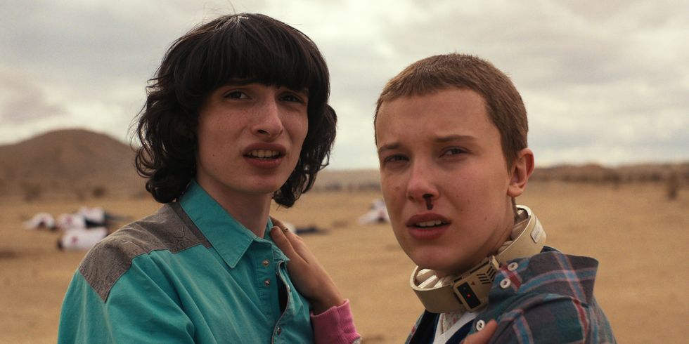 stranger things l to r finn wolfhard as mike wheeler and millie bobby brown as eleven in stranger things cr courtesy of netflix © 2022