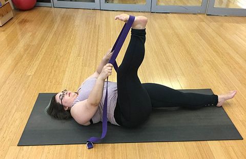 Strap assisted hamstring stretch