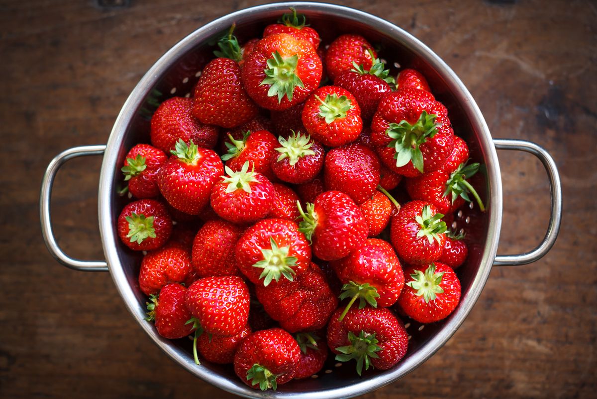 strawberries in colander