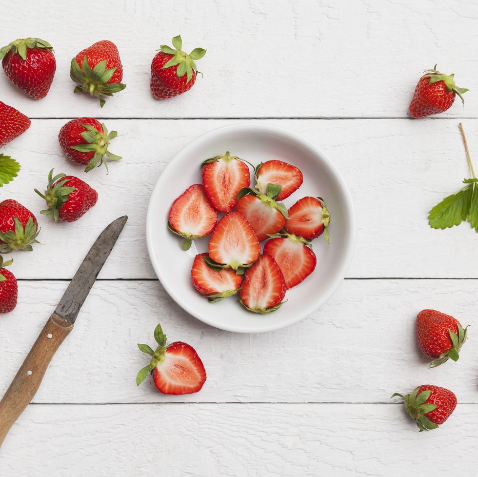 strawberries, chopped in white bowl