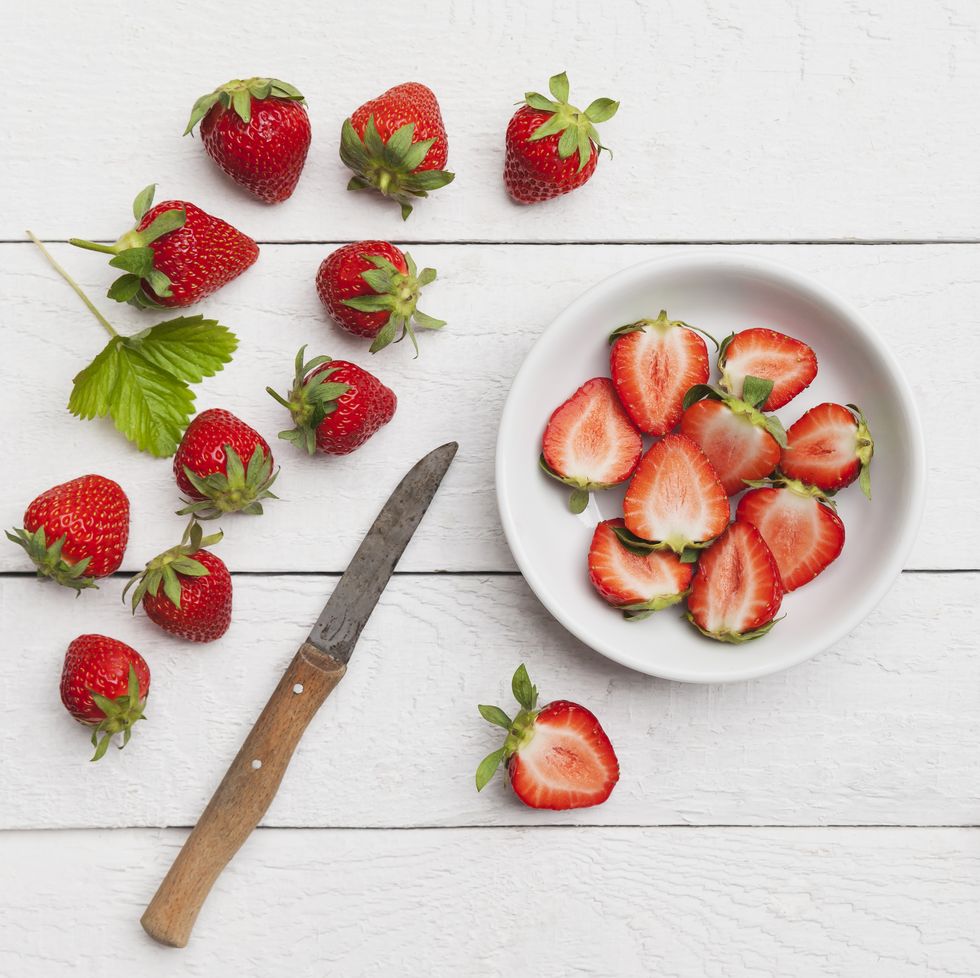 strawberries, chopped in white bowl