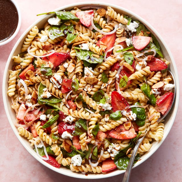 Strawberry Balsamic Pasta Salad pasta salad tossed with spinach, sliced strawberries, cheese, and balsamic dressing