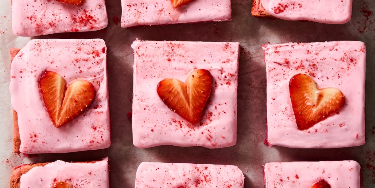 Strawberry Brownies pink brownies topped with pink icing and strawberry hearts