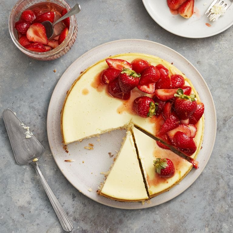 coconut crust cheesecake with strawberries on top