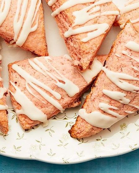 strawberries and cream scones with blue background