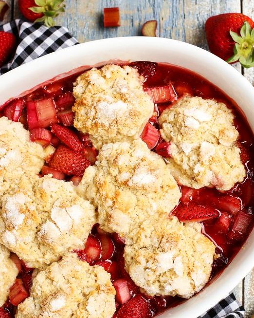 strawberry rhubarb cobbler with black and white napkin