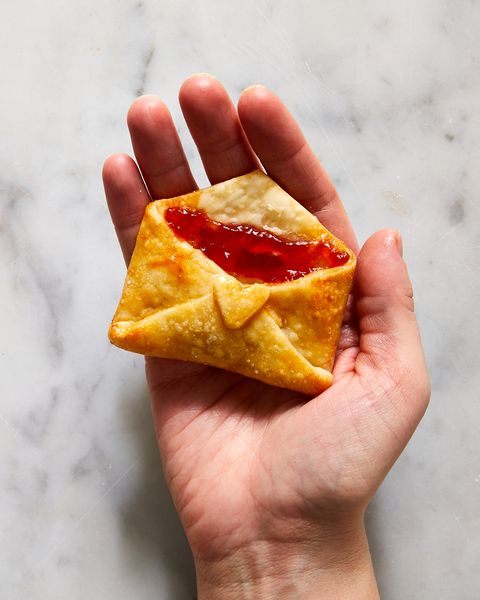 strawberry jam filled cookies that are folded and baked to look like love notes