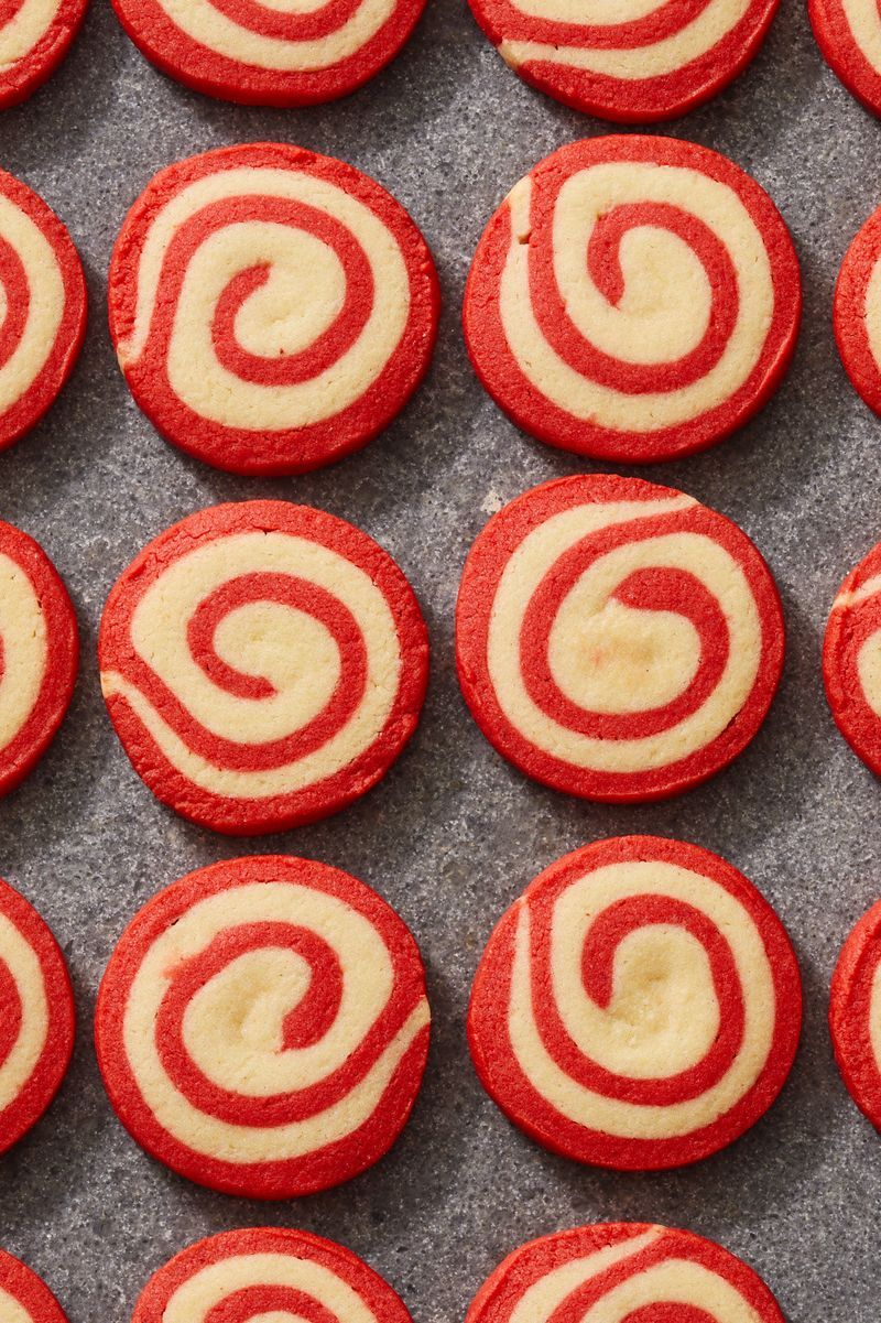 strawberry pinwheel cookies lined up in rows
