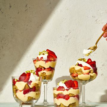 strawberry pistachio cake parfaits in clear glasses