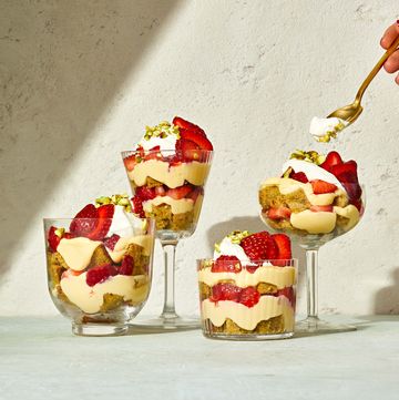 strawberry pistachio cake parfaits in clear glasses