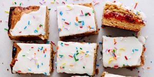 strawberry pop tart blondies with icing and sprinkles