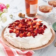 strawberry pavlova with rose wine in glasses