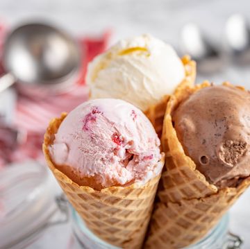 strawberry, vanilla, chocolate ice cream with waffle cone on marble stone backgrounds
