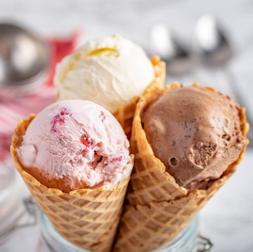 strawberry, vanilla, chocolate ice cream with waffle cone on marble stone backgrounds