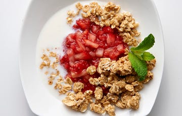 Mashed strawberries and granola