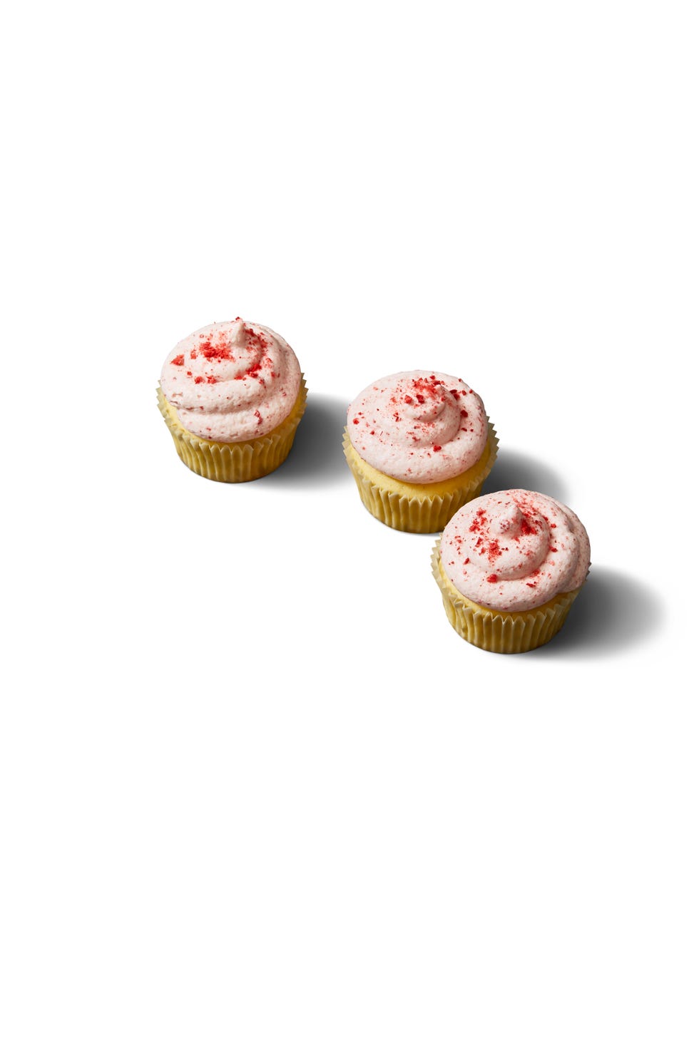 cupcakes with dried freeze strawberries on top