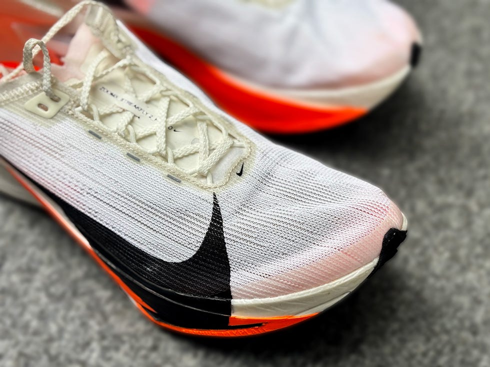 close up of a pair of nike running shoes