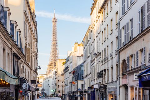 street and eiffel tower on a sunny morning, paris, france