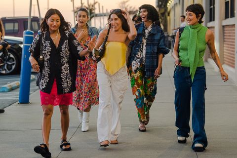 a group of friends wearing their most exuberant street style for nyfw