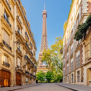 street with eiffel tower in the middle on a sunny day, paris, france