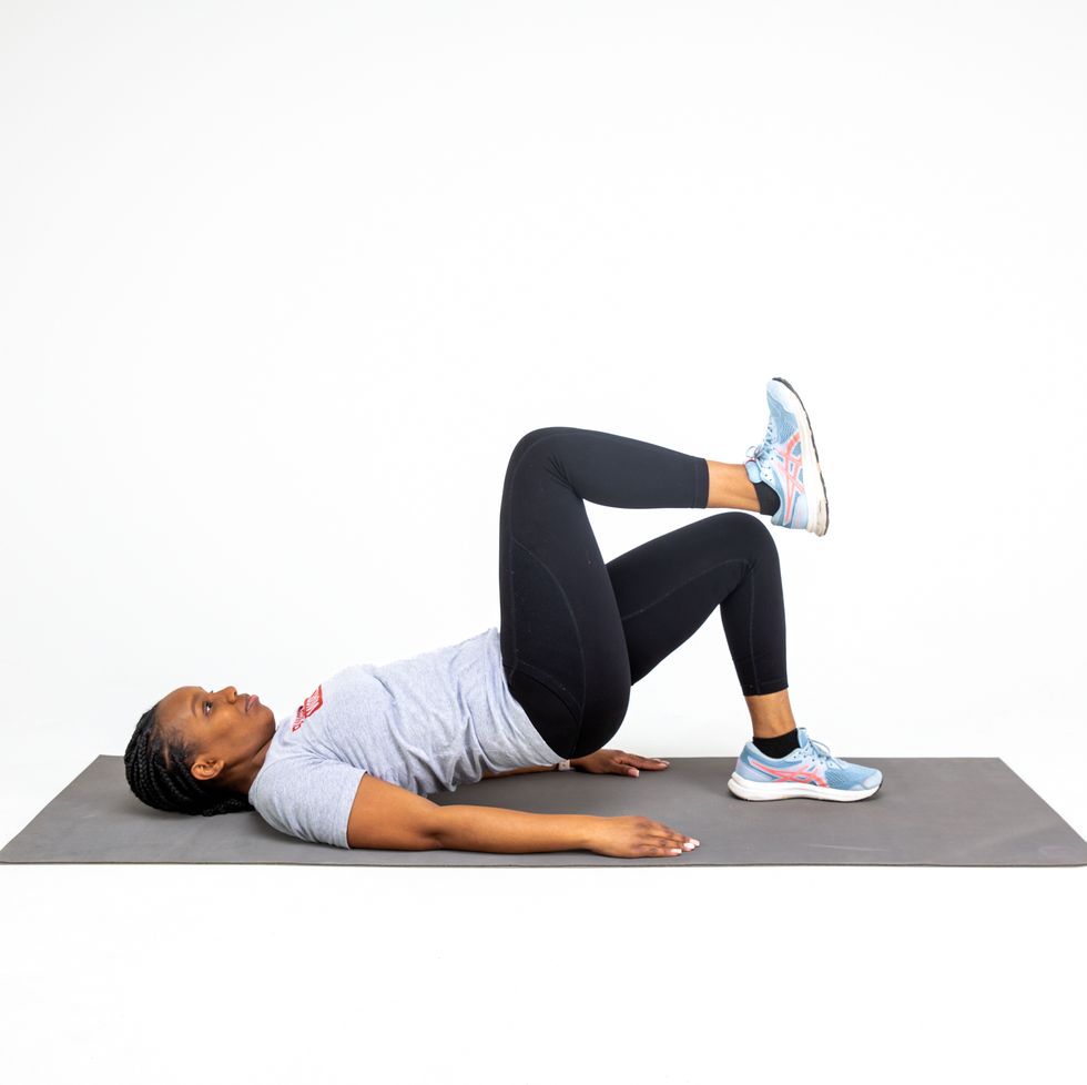a woman doing strength exercises against a white background