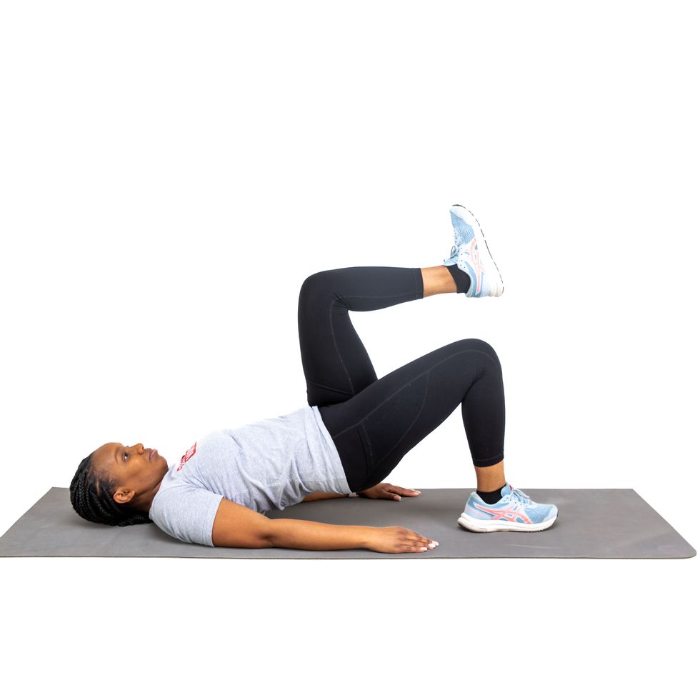 a woman doing strength exercises against a white background