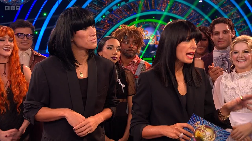 strictly come dancing 2024, carlos gu dresses as claudia winkleman for halloween in a black costume