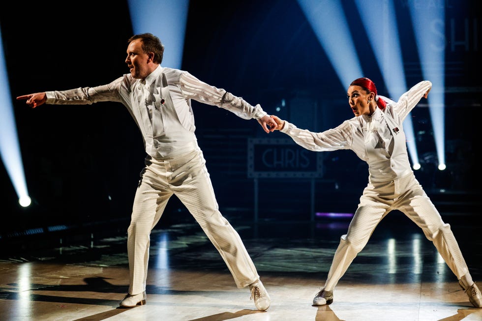 strictly come dancing 2024, week 8, chris mccausland and dianne buswell perform their couples choice wearing white suits