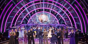 the cast of strictly come dancing stand together on the dance floor for week 4 of the 2021 series
