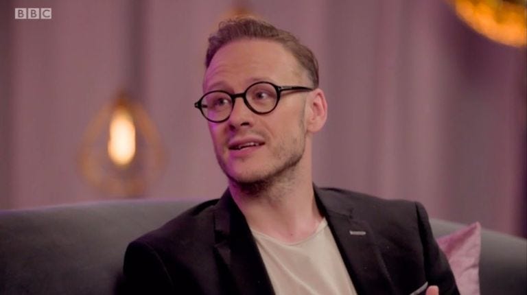 Eyewear, Facial expression, Glasses, Vision care, Cheek, Chin, Forehead, Facial hair, Smile, Photography, 