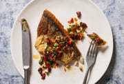 striped bass topped with herb olive salsa