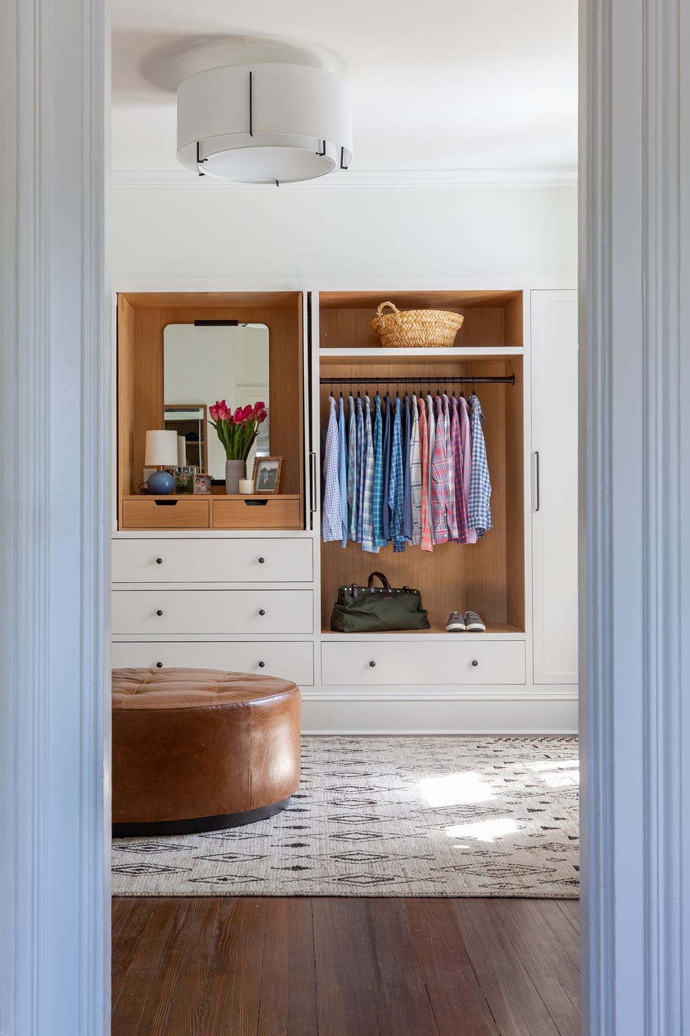 white walk in closet with vanity