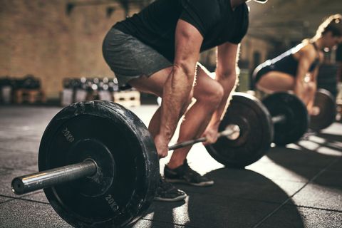 strong man doing deadlift training in gym