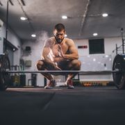 strong man doing deadlift training in gym
